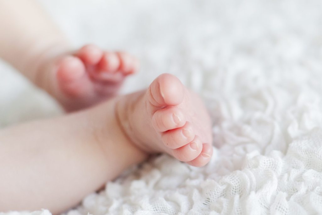Baby feet on soft surface