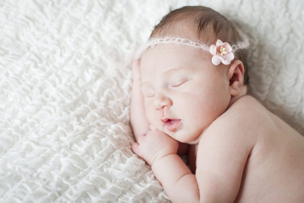 Sleeping baby with headband